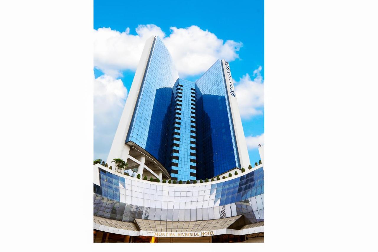 Montien Riverside Hotel Bangkok Exterior foto The new building of the university